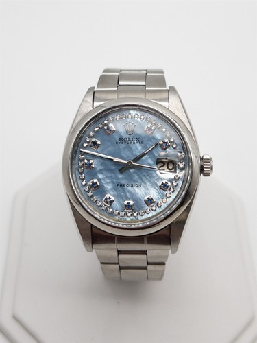 000 rolex oysterdate - $14,000, 34mm